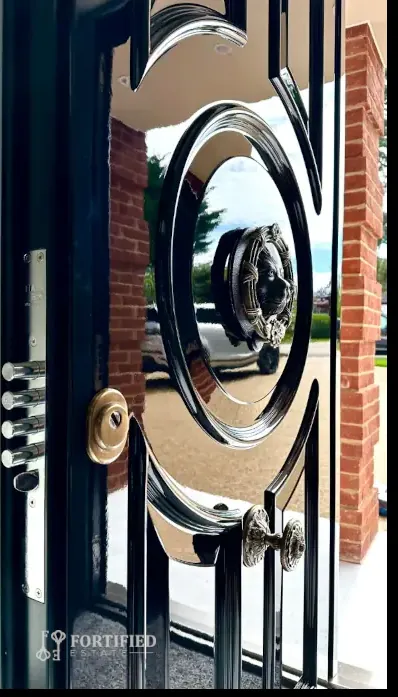 black residential steel security door with glass